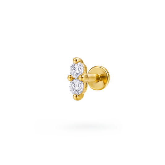 Gold hypoallergenic surgical steel labret piercing (Elmaiye Elara), suitable for tragus, helix, lobe, and conch piercings, shown as a minimalist stud-style body jewelry piece for ear cartilage and lobe use in the UK.